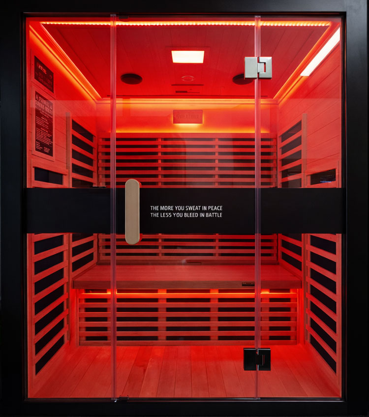 Infrared sauna cabin providing deep radiant heat for muscle relaxation and recovery.